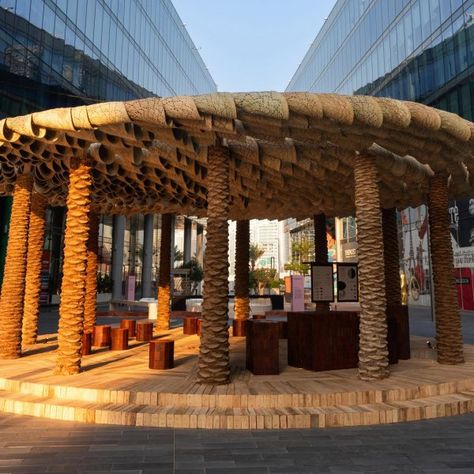 Emirati architect Abdalla Almulla made the Of Palm pavilion at Dubai Design Week using all parts of the palm tree, complete with ceilings constructed from woven leaf mats and palm-wood furniture. Dubai Design Week, Dubai Design, Palm Wood, Edwardian House, Tower Building, Out Of The Woods, Tree Trunks, Design District, Festival Design