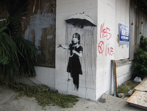 See 11 of Banksy's New Orleans paintings from 2008 | Archive | nola.com Banksy Mural, Street Art Banksy, Umbrella Girl, Graffiti Words, Banksy Graffiti, Banksy Art, Graffiti Artwork, Fantasy Magic, Street Graffiti