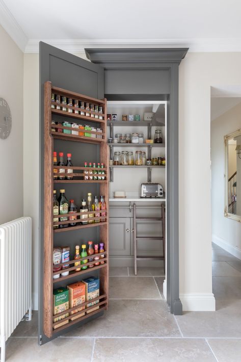 The walk in pantry at the Sevenoaks, Kent project is concealed behind a door finished in H|M Top Hat with spice racks to maximise food storage. #humphreymunson Pantry Inspiration, Kitchen Larder, Larder Cupboard, Pantry Room, Desain Pantry, Pantry Cupboard, Pantry Shelving, Small Pantry, Kitchen Pantry Design