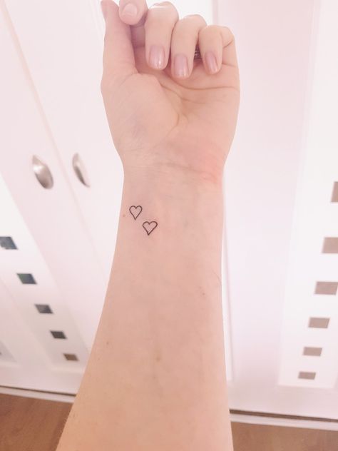 Love my 2 hearts wrist tattoo, one for each child on the veins to my heart Two Small Hearts Tattoo, Hearts On Wrist Tattoo, Hearts Wrist Tattoo, Heart On Wrist Tattoo, Heart Tattoo On Ankle, Small Heart Tattoo On Wrist, 2 Hearts Tattoo, Dainty Heart Tattoo, Heart Tattoo On Wrist