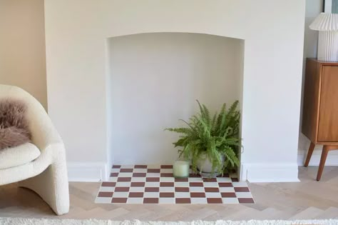 How to Tile a Decorative Fireplace Hearth Tutorial | Hunker Terracotta Tile Fireplace Hearth, Tiles Fireplace Hearth, Tile Inside Fireplace, Fireplace Herringbone Tile, Tiled Hearth Ideas, Fireplace Hearth Tile, Tiled Hearth, Tile Hearth, Fireplace Hearth Tiles