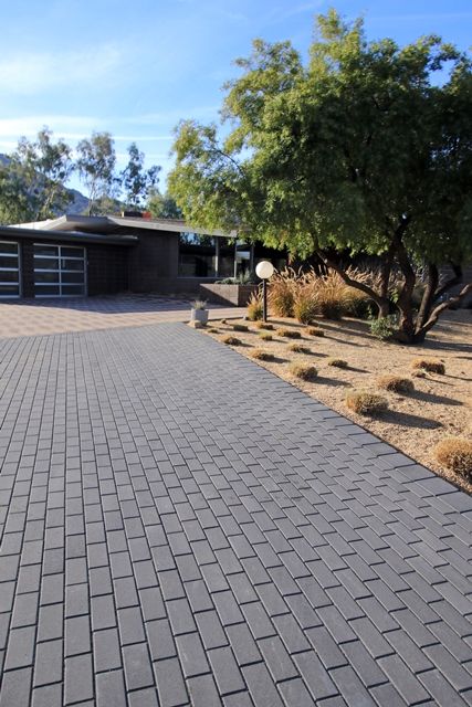 We love the rich charcoal color of these beautiful pavers! #ackerstone #pavers #holland #icpi Paver Patio With Fire Pit, Black Pavers, Driveway Tiles, Driveway Pavers Design, Fire Patio, Front Yard Entrance, Patio With Fire Pit, Cement Pavers, Cement House