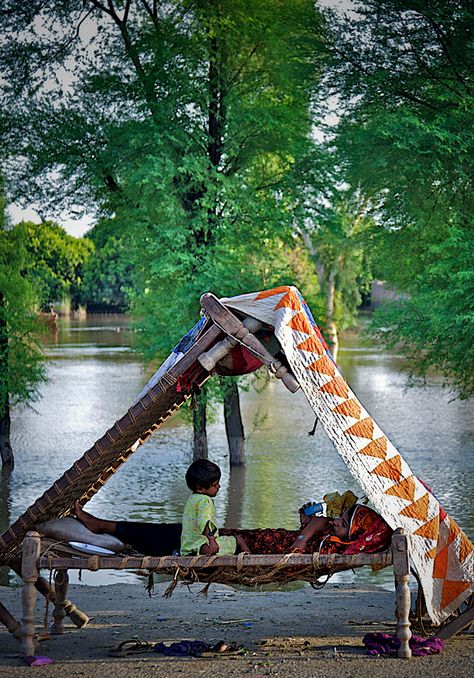 Tent life in flood. Pakistan Environment Pictures, Flood In Pakistan, Tent Life, Europe Switzerland, Wallpapers Nature, Nature Environment, Love Crystals, Tarot Card Readers, Genuine Smile