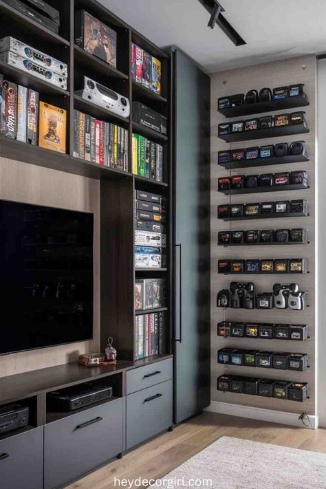 45 Super Cool Home Game Room Ideas - Hey Decor Girl [Latest Trending Decor Design Ideas] Gaming Room Storage Ideas, Games Console Storage Ideas, Closet Turned Gaming Room, Gaming Room Storage, Game Shelf Organization, Gamer Entertainment Center, Game Room Shelves, Video Game Display Ideas, Ultimate Game Room