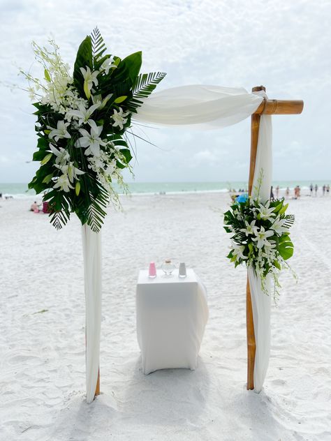 DeSalve Wedding Arch Wedding Arch Palm Leaves, Wedding Arch Beach Ideas, Beach Floral Arch, Monstera Wedding Arch, Tropical Ceremony Arch, Hawaii Wedding Arch, Ciara Wedding, Tropical Wedding Arch, Bamboo Wedding Arch