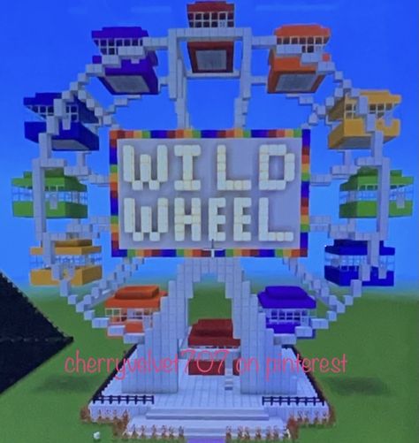 a white ferris wheel in minecraft with rainbow carts and a sign that says “wild wheel” that is glowing with a rainbow trim around the white rectangle backing Amusement Park In Minecraft, Theme Park Minecraft Ideas, Minecraft Theme Park Entrance, Minecraft Ferris Wheel, Minecraft Roller Coaster Ideas, Carnival Minecraft, Minecraft Theme Park Ideas, Minecraft Carnival Builds, Minecraft Park Idea