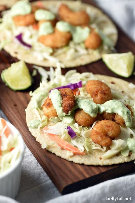 These Popcorn Shrimp Tacos with Cilantro Lime Sauce are so delicious and a lifesaver for busy weeknights! Popcorn Shrimp Tacos, Shrimp Taco Recipes, Homemade Corn Tortillas, Popcorn Shrimp, Cilantro Lime Sauce, Grilled Shrimp Recipes, Lime Sauce, Shrimp Tacos, Shrimp Recipe