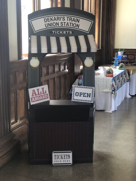 Diy Train Station Ticket Booth, Train Station Party, Train Station Props, Diy Train Station, Diy Train Decor, Cardboard Ticket Booth, Train Wedding Theme, Party Station Ideas, Train Signage