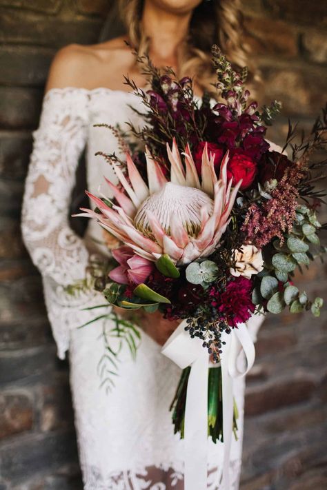 Best of 2018: bouquets. blush and burgundy bouquet with giant king protea Wedding Recovery, Holding A Bouquet Of Flowers, Protea Wedding, Protea Bouquet, Wildflower Wedding Bouquet, Wedding Flower Guide, Burgundy Bouquet, Holding A Bouquet, King Protea