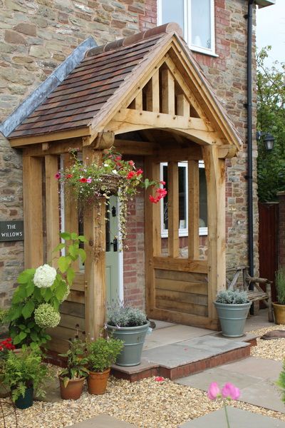 #RichOak Shelter yourself from the worst of the weather with a charming storm porch. Chorley. Shropshire. Portico Design, Border Oak, Cottage Front Doors, Porch Canopy, Oak Frame House, Best Front Doors, Cottage Porch, House Front Porch, Cottage Door