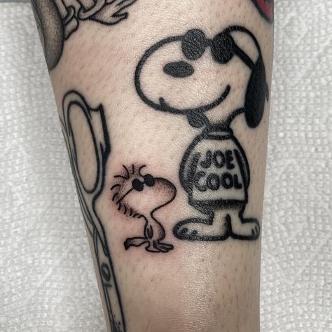 Added little Woodstock next to my joe cool snoopy on @kys_ink 🖤 Joe Cool Tattoo Snoopy, Charlie Brown Tattoo, Peanuts Tattoo, Joe Cool Snoopy, Cool Snoopy, Snoopy Tattoo, Browning Tattoo, Joe Cool, Cartoon Tattoos