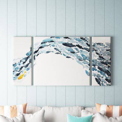 This 3-piece set of painting prints on canvas features a school of fish swimming with an ocean current for an essential coastal-themed accent. A cool palette of blue and gray fish flow from one side to the other, with an eye-catching goldfish swimming alongside. Three panels of one painting hung side by side is called a triptych, and allows you to customize the width of the image to best suit your space. Each piece is made of matte canvas with a kiln-dried pine wooden frame, and overall, togethe School Of Fish Wall Decor, Ocean Wall Painting, Costal Vibe, Greek Vibes, Chosen Series, Goldfish Swimming, Coastal Accessories, Carved Headboard, Beach House Wall Decor