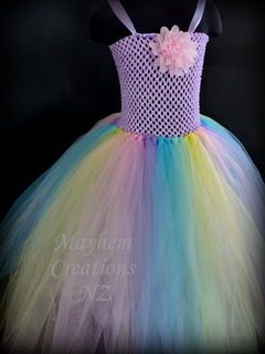 Mayhem Pastel Rainbow tutu dress. Mayhem creations is based in Auckland but we sent throughout NZ. This dress is a great price at just $41-$46 up to size 6 yrs. If you prefer a different coloured bodice we are happy to customise this to what ever you prefer. You can click on the website link or email us at mayhemcreations@xtra.co.nz Rainbow Tutu Dress, Diy Tutu Dress, Fruit Dress, Diy Tutus, Princess Tutu Dress, Long Tutu, Girls Smocked Dresses, Rainbow Tutu, Princess Flower Girl Dresses