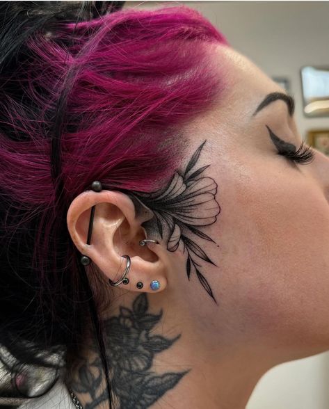 Over Eyebrow Tattoos For Women, Colored Tattoos Dark Skin, Women Small Face Tattoo, Small Women Face Tattoos, Behind Ear Cover Up Tattoos For Women, Sideburn Tattoos For Women, Side Scalp Tattoo Women, Edgy Chest Tattoos For Women, Above Ear Tattoo