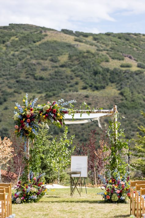 Colorful Chuppah Flowers, Wildflower Chuppah, Green Ceremony Arch, Chuppah With Flowers, Chuppah Florals, Green Chuppah, Colorful Chuppah, Wildflower Wedding Ceremony, Wedding Chuppah Flowers