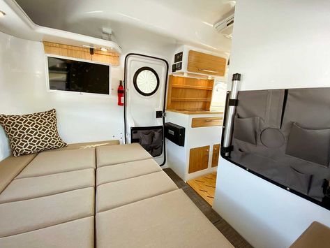 The Happier Camper Traveler is a lightweight, fully-equipped trailer with all the comforts of home plus lots of flexibility. Happier Camper, Lightweight Campers, Cool Cube, Adventure Hat, Cube Unit, Tiny Home On Wheels, Trailer Interior, Outdoor Patio Table, Small Suv