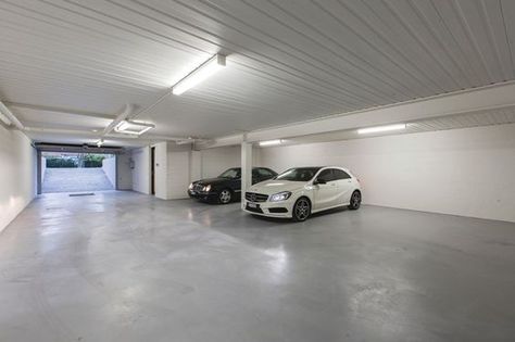 Basement Garage Ideas, Basement Car Parking Design, Luxury Garage Underground, Simple Garage Ideas, Basement Parking House, Underground Garage House, Under House Garage, Underground Car Garage, House With Garage Underneath