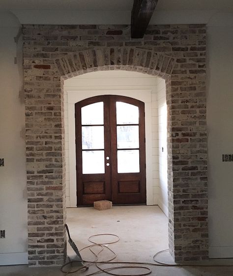 Interior brick arch and fireplace - The Refined Farmhouse Brick Arches Interior, Brick Arch Fireplace, Brick Entryway, Red Brick Interior, Arch Fireplace, Brick Arches, Brick Yard, Brick Archway, Chicago Brick