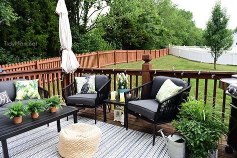 Maximize Outdoor Space! Learn How to Decorate a Small Deck or Patio and what kind of plants to use to keep mosquitos and other pests away. Get all the details at TidyMom.net Deck Furniture Layout, Outdoor Deck Decorating, Deck Or Patio, Back Deck Decorating, Small Deck Decorating Ideas, Outdoor Deck Furniture, Deck Decorating Ideas, Small Deck, Patio Decorating Ideas On A Budget