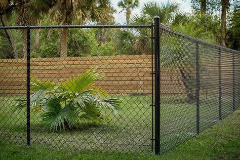 What is the Cheapest Fence to Build (With 4 Examples) Black Chain Link Fence, Chain Link Fence Installation, Cheap Privacy Fence, Corrugated Metal Fence, Fence Options, Wire Mesh Fence, Black Fence, Cheap Fence, Fencing Material