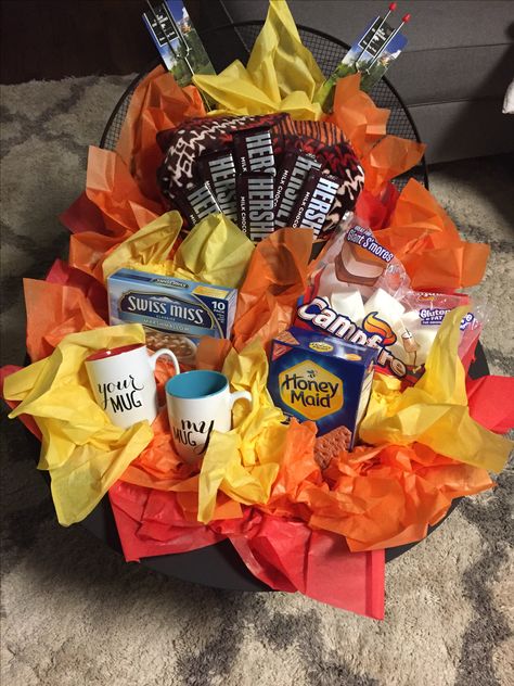 Campfire Survival Kit: Auction Basket for Fall Festival at my sons school! Fall Festival Selling Ideas, Fall Festival Raffle Basket Ideas, Fall Raffle Basket Ideas For Adults, October Secret Pal Ideas, Bonfire Basket Ideas, Campfire Gift Basket, Fall Festival Gift Basket Ideas, Campfire Basket Ideas, Fall Silent Auction Basket Ideas