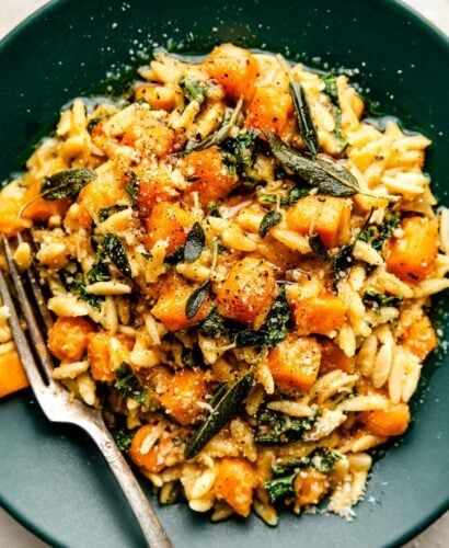 Similar to risotto, this Creamy Butternut Squash Orzo is a one-pot recipe made by simmering orzo pasta with butternut squash and fragrant aromatics like fresh sage and garlic. The squash breaks down as it cooks, creating a beautifully creamy sauce with autumnal flavor. Finish with parmesan cheese and wilted kale to create a cozy, veggie-loaded dinner, ready in 35 minutes or less! Easily vegetarian, vegan, and dairy-free. #butternutsquashorzo #butternutorzo #orzorecipes #onepotmeals #dinnerideas Butternut Squash Orzo, Squash Orzo, Pasta With Butternut Squash, Wilted Kale, Squash Pasta Recipe, Butternut Squash Kale, Butternut Squash Sauce, Creamy Butternut Squash, Squash Risotto