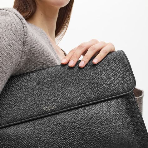 Our Leather Laptop Case is the stylish answer to carrying your laptop on the go. Handcrafted from full-grain leather, a flap closure opens to reveal a single compartment lined in butter soft grosgrain which accommodates your laptop. A magnetic-dot closure and corner stitching complete the design. Create a truly unique gift for yourself or a loved one by personalising our Leather Laptop Case with our luxury personalisation service. Corner Stitching, Artist Portfolio Book, Leather Laptop Case, Aspinal Of London, Leather Laptop, Black Pebbles, Leather Sleeve, Laptop Case, Full Grain Leather