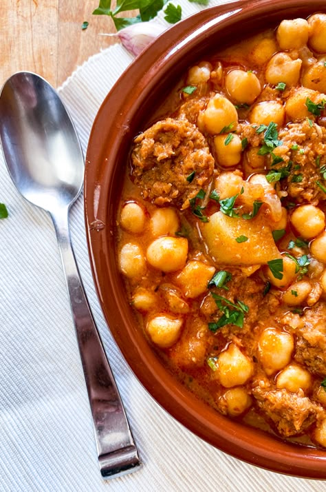 Spanish Chickpea & Chorizo Stew | Potaje de Garbanzos y Chorizo Recipe Vegetarian Chorizo Dishes, Spanish Garbanzo Bean Recipes, Spanish Garbanzo Bean Stew, Chorizo And Chickpea Stew, Soup With Chorizo, Chickpea Chorizo, Spanish Garbanzo Bean Soup, Chorizo Stew, Chorizo Stew Recipes