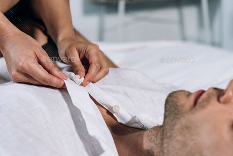 partial view of woman unbuttoning shirt of man lying in bed Man Lying Down, A Lying Man, Woman Sitting Mans Lap, Person Lying In Bed Reference, Man Sleeping On Womans Lap, Lying In Bed, Web Photos, Web Themes, Video Footage