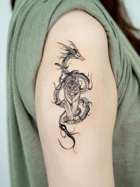 #tattoo   #tattoo lover    #tattoo designs   #tattoo ideas   #tattoo art   #mysterious tattoo    #aggressive tattoo    #animal tattoo   #animal tattoo art   #animal tattoo designs   #animal tattoo in summer Dragon Tiger Tattoo, Tattoos Infinity, Filmy Vintage, Tattoos Mandala, Dragon Tattoo For Women, Flame Tattoos, Dragon Fire, Illustration Tattoo, Upper Arm Tattoos