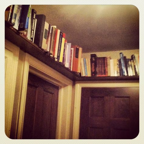 Books Above Door, Bookshelf Above Door, Shelf Above Doorway, Above Door Shelf, Shelf Above Door, Hallway Bookshelf, 2024 Growth, Enclosed Balcony, Cottagecore House