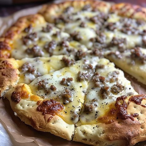 If you’re on the hunt for a breakfast recipe that combines the heartiness of biscuits and gravy with the fun of a pizza, look no further! This Biscuits and Sausage Gravy Breakfast Pizza is a ... READ MORE Biscuit And Gravy Pizza, Sausage Gravy Breakfast Pizza, Air Fryer Biscuits, Sausage Gravy Breakfast, Biscuit And Gravy, Gravy Breakfast, Biscuits And Sausage Gravy, Biscuits And Sausage, Biscuit Pizza