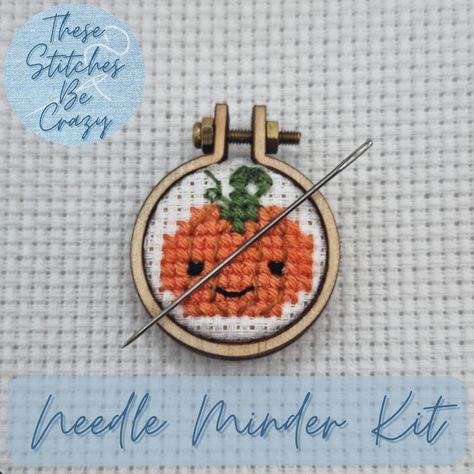 This listing is for a full kit to make your own Kawaii Pumpkin Needle Minder. You WILL NOT receive a ready assembled needle minder. PLEASE READ ALL INFORMATION BEFORE ORDERING If you have any questions at all feel free to message me! Included in this kit: Kawaii Pumpkin chart & full assembly instructions 4cm x 4cm piece of white 16 count aida DMC threads (310, 721, 782, 3346) 1 mini wooden embroidery hoop with screw & 2 hex nuts 1 handmade with love wooden button 2 neodymium magnets (1 pre-glued to middle section of embroidery hoop, 1 pre-glued to wooden button) 1 navy blue organza gift bag What else you will need (not included) Needle, superglue, tweezers, embroidery scissors, small clamps (optional) Types of stitches: Fractional cross stitch & backstitch The width of this needle minder i Free Mini Cross Stitch Patterns, Mini Halloween Cross Stitch Patterns Free, Small Cross Stitch Patterns Free Minis, Mini Fall Cross Stitch Patterns, Tiny Pumpkin Cross Stitch, Mini Pumpkin Cross Stitch, Cute Ghost Cross Stitch, Cross Stitch Blackwork, Needle Minder Diy