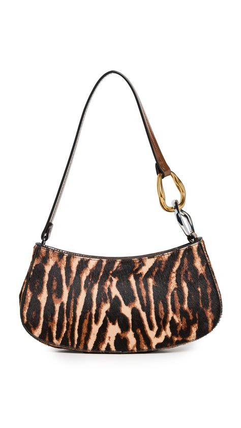 PRICES MAY VARY. Chain accent at handle , Leopard print Length: 9in / 23cm, Height: 4.25in / 11cm, Strap drop: 8.75in / 22cm, Depth: 2in / 5cm Weight: 12oz / 0.34kg Ollie Bag Leopard Print Purse, Cheap Trendy Leopard Print Shoulder Bag, Everyday Leopard Print Shoulder Bag, Leopard Print Shoulder Bag With Top Handle, Leopard Accessories, Luxury Leopard Print Shoulder Bag, Camo Stuff, Leopard Purse, Leopard Print Bag