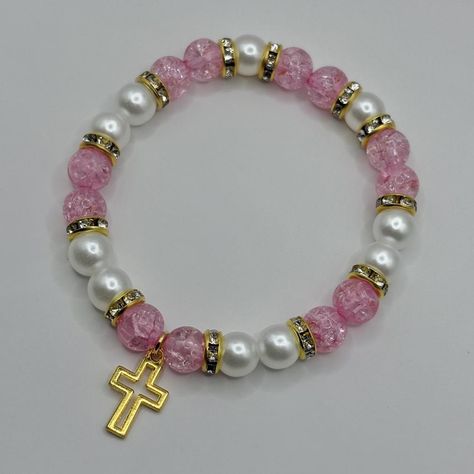 Pink pearl beaded bracelet with gold cross charm🩷
-Made with glass and acrylic beads
-Made with elastic band
-Message me any time 🫶🏽
-
#y2kaccessories #bracelets #goldjewelry #pink #coquette Cute Bracelet Ideas Pink, Bracelet Combos Jewelry, Pony Bead Bracelets Patterns, Cute Bracelets Ideas Beads, Bracelet Stand Ideas, Bracelet Ideas Glass Beads, Pink Bracelet Aesthetic, Bracelet Inspo Beads, Glass Beads Bracelet Ideas