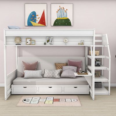 This bunk bed is the perfect space-saving solution for any bedroom, constructed with durable pine wood and MDF and supported by sturdy slats, without the need for a box spring. The innovative design folds the bottom bed into a comfortable seating area during the day, while the three built-in drawers provide ample storage space for clothes and toys. Due to different photographic light sources or your monitor, the actual color may be slightly different. Bed Frame Color: White | Harriet Bee Dalvey Bunk Bed Rooms Decor, Loft Bed With Couch, Bedroom Futon, Staircase Wood, Ikea Bunk Bed, Storage Staircase, Bunk Bed With Storage, Futon Bunk Bed, Bunk Beds With Drawers