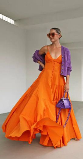 Orange button up maxi dress + purple cardigan and handbag Makeup Orange Dress, Orange Dress Makeup, Makeup Look Orange, Ropa Color Neon, Orange Dress Outfits, Makeup Orange, Off Shoulder Ball Gown, Combination Dresses, Colour Combinations Fashion