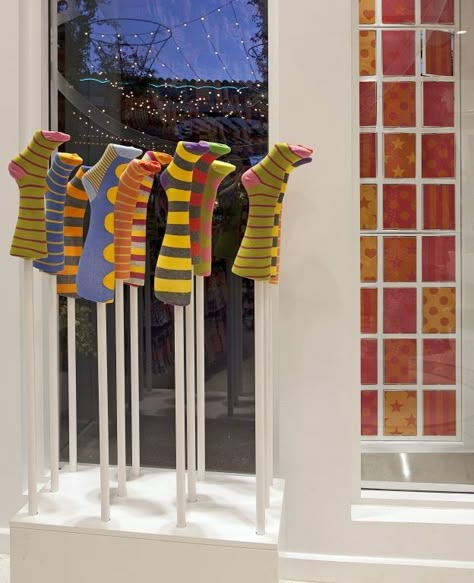 Socks Display, Firefighter Boots, Sock Display, Sock Store, Retail Store Interior Design, Visual Merchandising Displays, Showroom Display, Store Interiors, Store Windows