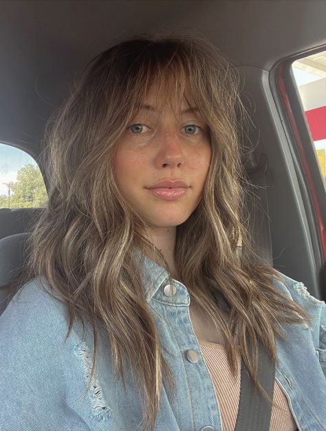 fringe bangs, 70’s hair, selfie Shag Haircut Blonde Highlights, Women’s Wolf Cut Haircut Long, 90s Shag Hair Long, Shag Thick Wavy Hair, Boho Fringe Hair, Long Shag With Side Part, Summer Shag Haircut, Wavy Mid Length Haircut, Mid Length 70s Hair