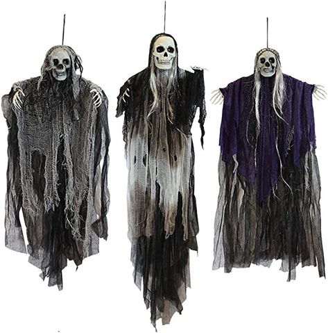 GREAT VALUE SET: JOYIN set of 3 scary skeleton hanging grim reapers with different dress and size helps you create creepy and scary atmosphere for any Halloween events

ADJUSTABLE ARMS: Arms can be adjusted, put them in the front to act as he is flying to the guest or put them on side to act as he is floating in the air

DIMENSIONS: The big flying grim reaper measures about 53 inches/135cm tall; 2 small flying grim reaper measures about 31.5 inches/80cm tall Hanging Skeleton, Halloween Hanging Ghost, Creepy Skull, Halloween Hanging Decorations, Outdoor Nativity Scene, Skeleton Ghost, Scary Skeleton, Halloween Skeleton Decorations, Outdoor Nativity