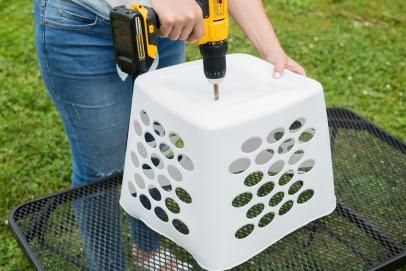 Upcycle a Plastic Laundry Basket Into a Summery Planter | HGTV Diy Extra Large Planters Outdoor, Upcycled Planters Outdoor, Upcycle Plastic Plant Pots, Patio Planters Outdoor, Trash Can Planter Ideas, Backyard Planter Ideas, Cheap Planter Ideas, Diy Planter Pots, Laundry Basket Planter