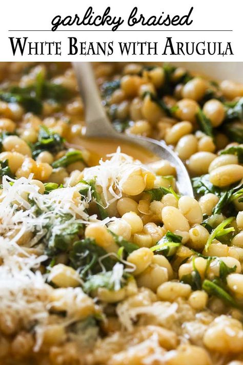 Arugula adds brightness and a peppery flavor to this simple and healthy recipe for Italian braised white beans with garlic and tomatoes. It's a satisfying side dish for all sorts of meals, especially grilled or seared lamb chops or steak. | justalittlebitofbacon.com #italianrecipes #sidedish #mediterraneandiet #beans #italianfood White Bean Recipes Italian, Braised White Beans, Elin Hilderbrand Recipes, Flageolet Beans Recipes, Braised White Beans And Greens, Lemony Pasta With Braised White Beans, White Beans With Tomato And Garlic, Roasted Tomatoes With White Beans And Basil, White Bean Arugula Salad