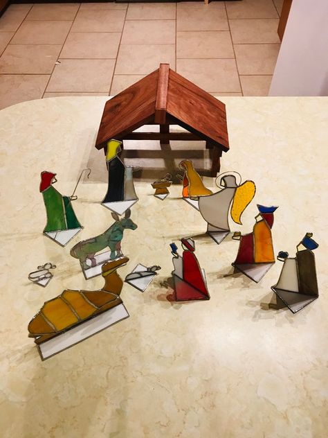 A Stained Glass Nativity Scene. Barn is 9 tall,12 wide and 7 deep. Figurines are approximately 8 tall. Figurine bases are white. Stained Glass Nativity Scene, Glass Nativity Scene, Stained Glass Nativity, Christmas Fundraiser, Stained Glass Religious, Stain Glass Art, Christmas Stained Glass, Painted Decor, Stain Glass Patterns