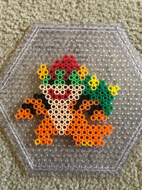 Perler Beads Disney Villains, Mario Characters Perler Beads, Mario Melty Bead Patterns, Mario Melty Beads, King Boo Perler Beads, Perler Bead Bowser, Perler Designs Ideas, Nerd Perler Bead Patterns, Unique Perler Bead Ideas