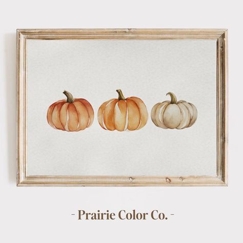 Add a touch of autumn elegance to your home with this "Pumpkins Watercolor Painting Print." This digital download features a beautiful arrangement of three pumpkins, delicately painted in watercolor with soft shades of orange, cream, and green. Each pumpkin is uniquely detailed, capturing the gentle blending of colors and the natural texture of watercolor. The minimalist design and light, airy background make this piece perfect for adding a subtle seasonal charm to your decor. Ideal for fall decorating, this print adds warmth and a festive touch to any room, from kitchens to living areas. This high-resolution digital file allows you to print the artwork in various sizes to fit your space perfectly. Enjoy the flexibility of a digital download that you can print as many times as you like for Watercolor Fall Background, Pumpkin Watercolor Art, Framed Watercolor Painting, Simple Fall Watercolor Paintings, Fall Watercolor Paintings Easy, Fall Watercolor Paintings, Airy Background, Fall Art Prints, Watercolor Pumpkins Autumn