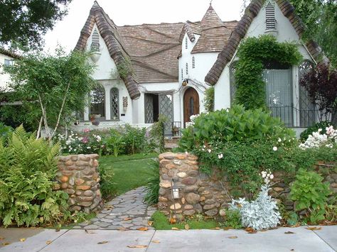 The phrase “storybook cottage” is one of the most evocative architectural terms, conjuring images of cute little homes right out of fairy tales. Can’t you imagine Snow White walking out of this home? Storybook House, Cottage Porch, Storybook Homes, Farmhouse Interior Design, Fairytale Cottage, Storybook Cottage, Cottage Style Homes, Victorian Cottage, Tudor House