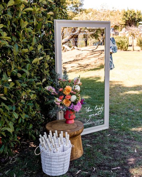 Give your wedding guests a warm welcome by ushering them into your garden wedding with a gorgeous mirrored sign. Hannah & Jordan also included pretty sun parasols for their beautiful sunny afternoon wedding. @ashhughesweddings #weddingmirror #gardenwedding #gardenweddingstyle #gardenweddingideas #geelongweddings #geelongbrides Backyard Wedding Welcome Sign, Simple Garden Theme Wedding, Garden Wedding Signs, Mirrors At Weddings, Back Garden Wedding Uk, Garden Wedding Welcome Sign, Spring Garden Party Wedding, Wildflower Barn Wedding, Backyard Garden Party Wedding