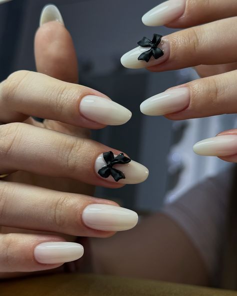 You can’t go wrong with milky white and a bow tie 🎀 My fave from @her.shop.ro . . . #milkywhitenails #bownails #simplenails #cutenails #naturalnails Milky White Butterfly Nails, Bow Tie Nails Design, White Nails With Pink Bow, White Nails With Bows And Pearls, Bow Nails Black And White, Bow Tie Nails, Casual Sporty Outfits, X Nails, Milky Nails