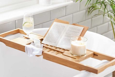 The Aldi bath tray is back in stock! Quick... it'll be gone soon | Real Homes Bathtub Storage, Bathtub Sizes, Wooden Bathtub, Bath Board, Tub Tray, Bathtub Caddy, Wine Book, Bath Shelf, Bathtub Tray