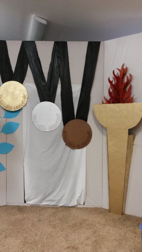 medals and olympic torch Olympic Themed Vbs Decorations, Olympic Float Ideas, Office Olympics Decorations, Olympic Theme Party Decorations Ideas, Olympic Games Party Decorations, Olympic Games Decorations, Olympic Parade Float Ideas, Olympic Theme Classroom Decorations, Olympics Trunk Or Treat